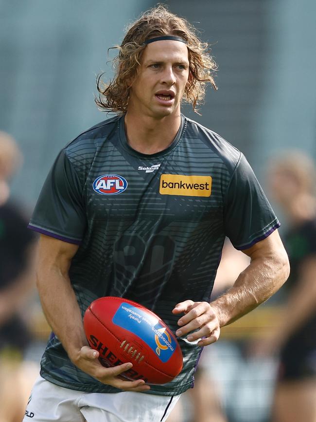 Fremantle star Nat Fyfe warms up before starting as the sub against Richmond at the MCG last Sunday. Picture: Michael Willson/AFL Photos via Getty Images