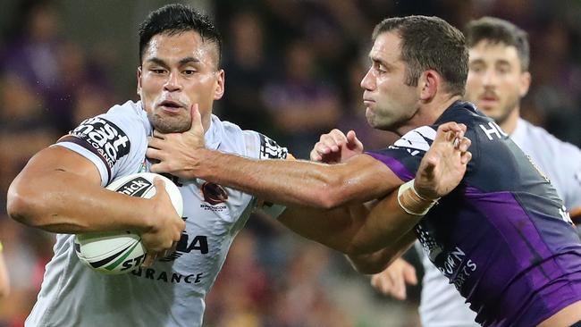 The Broncos’ Herman Ese'ese is tackled by the Storm’s Cameron Smith in Round 3. Photo: Getty Images