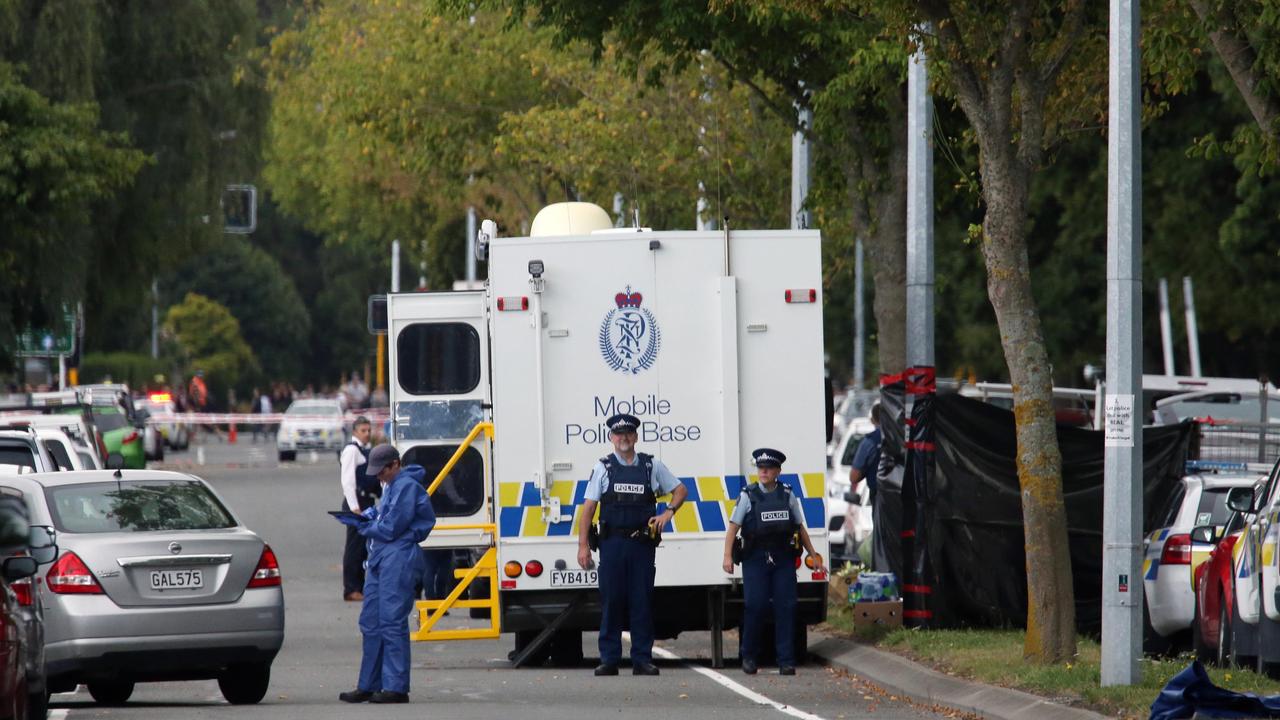 The day after the attacks, police begin the grim task of removing bodies from the Al Noor mosque and loading them into hearses. Picture: Gary Ramage.