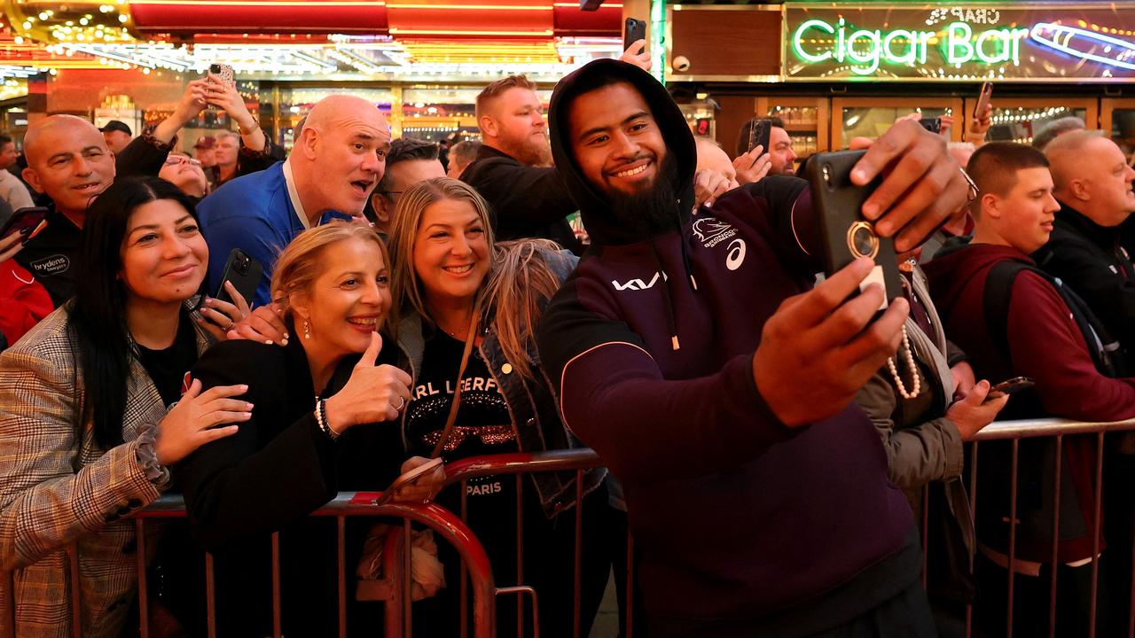 Payne Haas poses with fans at the Fremont Street Experience in Las Vegas. Picture: EZRA SHAW / GETTY IMAGES NORTH AMERICA / Getty Images via AFP