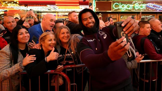 Payne Haas poses with fans at the Fremont Street Experience in Las Vegas. Picture: EZRA SHAW / GETTY IMAGES NORTH AMERICA / Getty Images via AFP