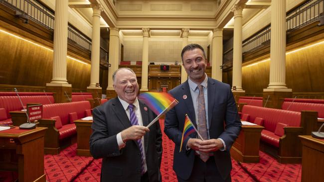 First and only two openly gay MPs in state parliament Ian Hunter (Labor) and Robert Simms (Greens) on the legislative council floor. Picture: Brett Hartwig