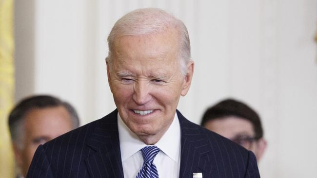 WASHINGTON, DC - JANUARY 4: Fashion designer Ralph Lauren greets U.S. President Joe Biden before being awarded the Presidential Medal of Freedom in the East Room of the White House on January 4, 2025 in Washington, DC. President Biden is awarding 19 recipients with the nation's highest civilian honor. (Photo by Tom Brenner/Getty Images)