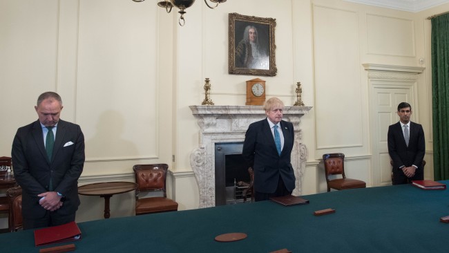 Prime minister Boris Johnson stands inside the Cabinet Room to observe a minute's silence in tribute to the NHS staff and key workers on April 28, 2020. Picture: Getty Images