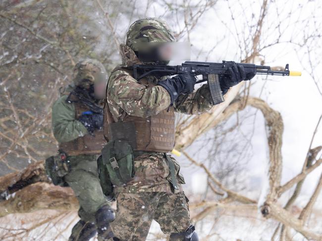 Ukrainian trainees perform a section attack during a field phase of the first rotation of Operation Kudu in the United Kingdom. *** Local Caption *** Australia continues to stand with the people of Ukraine, and is providing ongoing support in response to Russiaâs continuing violation of international law.  Having arrived the United Kingdom in January 2023, a contingent of up to 70 ADF personnel have joined partner nations in the UK-led and based training programme for Ukrainian recruits.