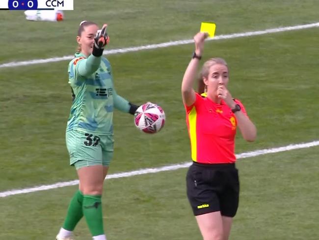 Wellington Phoenix keeper Carolina Vilão is seen flipping the bird behind the referee’s back.