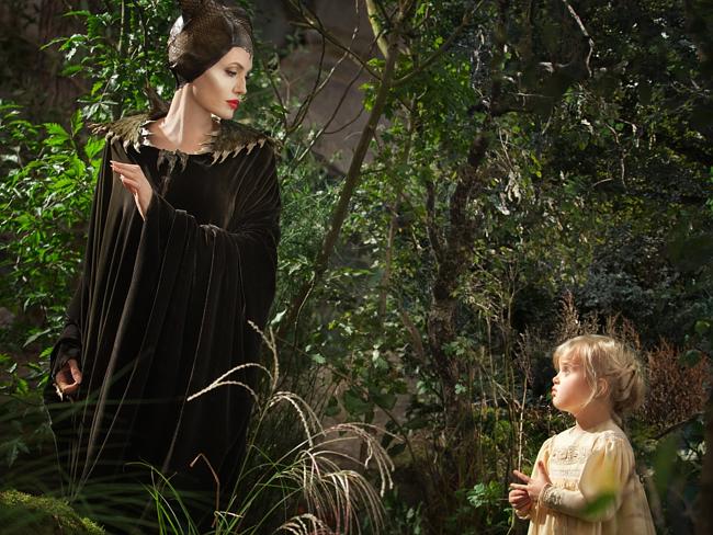 Family footsteps... Angelina Jolie as evil witch Maleficent, in a scene with her daughter Vivienne Jolie-Pitt in upcoming Disney film Maleficent. Picture: AP/Disney