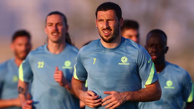 DUBAI, UNITED ARAB EMIRATES - MAY 27: The Socceroos warm up during an Australian Socceroos training session on May 27, 2021 in Dubai, United Arab Emirates. (Photo by Francois Nel/Getty Images)