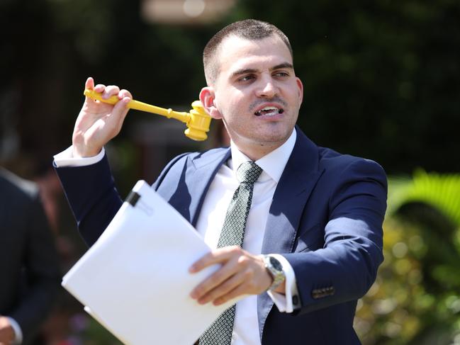 SUNDAY TELEGRAPH. MARCH 16, 2024.Pictured is auctioneer Alex Pattaro during an auction at Unit 4/126 Chuter Ave, Ramsgate Beach. Picture: Tim Hunter.