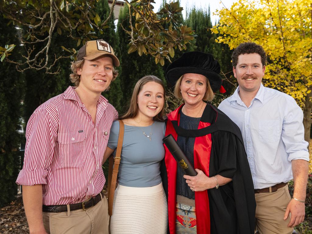 Doctor of Philosophy graduate Anthea Fagan with her children Hamish (left), Dimity and Duncan Chalmers at a UniSQ graduation ceremony at Empire Theatres, Wednesday, June 28, 2023. Picture: Kevin Farmer