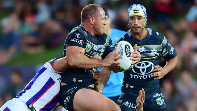 Cowboys against the Newcastle Knights at 1300SMILES Stadium. Cowboys Matt Scott and Johnathan Thurston. Picture: Evan Morgan