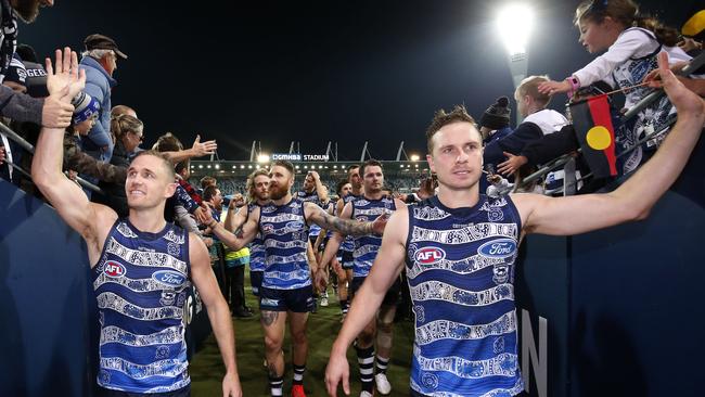 Joel Selwood and Mitch Duncan celebrate a Geelong victory. Picture: Darrian Traynor/Getty Images.