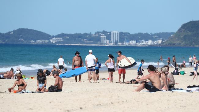 People on the beach at Miami on the Gold Coast. Photograph: Jason O'Brien