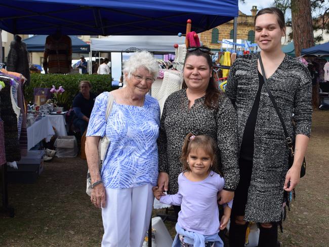 (Back, from left) Margaret, Tracy, Tiara Brown and (front) McKenzie Marshall, 3, at the Potter's Craft Market for Jumpers and Jazz in July.