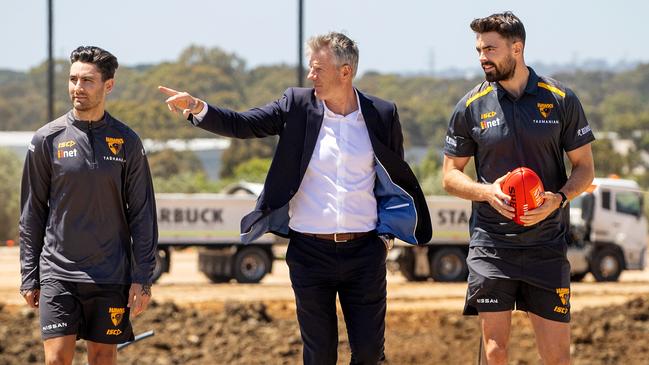 Gowers talks through progress with players Chad Wingard and Conor Nash. Picture: Mark Stewart