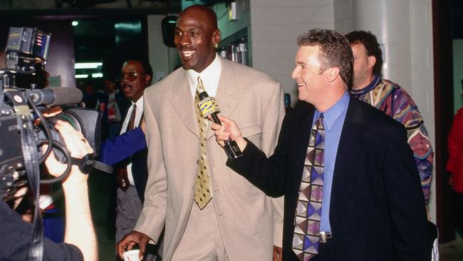 Suits him! Michael Jordan, his two-piece suit and gold earring (as seen in 1997). Picture: AFP