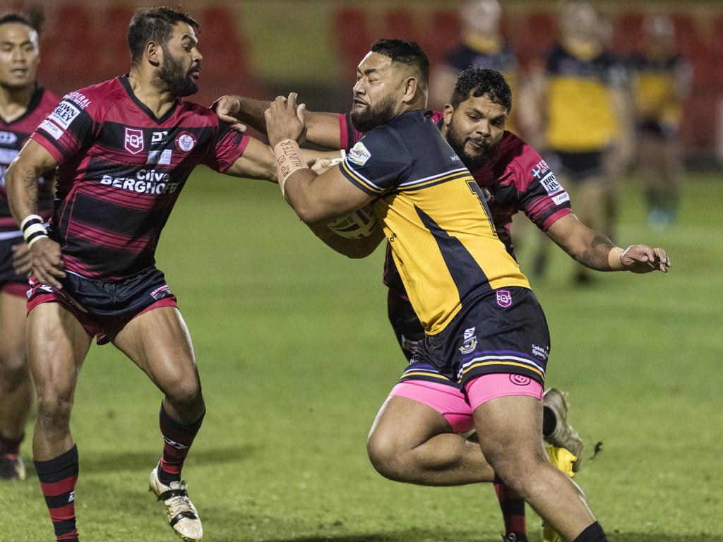 Sione Foueti of Gatton is tackled by Matthew Waites (left) and Dwayne Duncan of Valleys. Picture: Kevin Farmer.