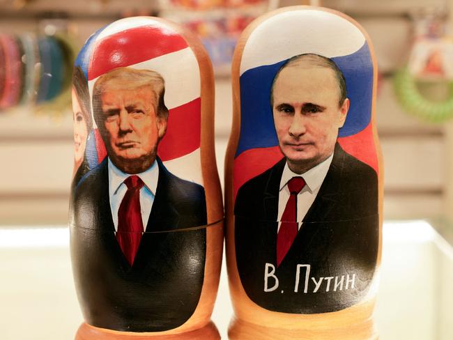 A gift shop in the nation’s capital displaying traditional Russian wooden nesting dolls depicting the two Presidents side-by-side. (Photo by TATYANA MAKEYEVA / AFP)