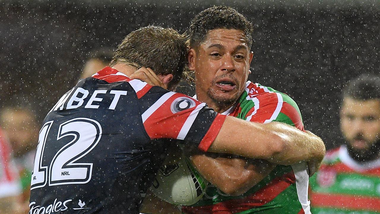 Dane Gagai of the Rabbitohs is tackled by Mitchell Aubusson of the Roosters