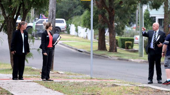 Detectives collect evidence at a Rooty Hill address earlier this year after an incident during which 14 shots were fired into a home believed to belong to Rishaad Christian.