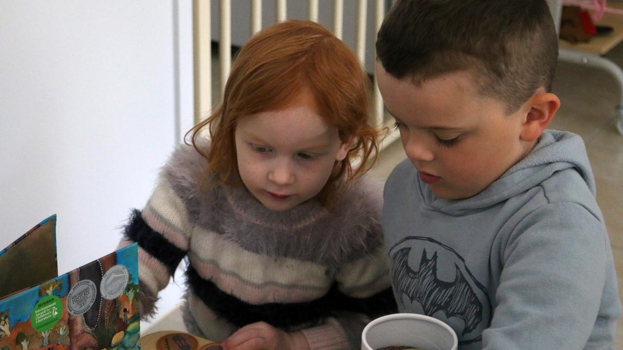 Cooper and Rosalie doing an activity with Jacinta.