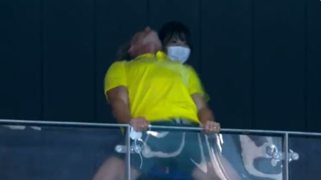 Coach Dean Boxall celebrates in the stands as Ariarne Titmus claimed gold in the women’s 400m freestyle in Tokyo. Picture: Channel 7