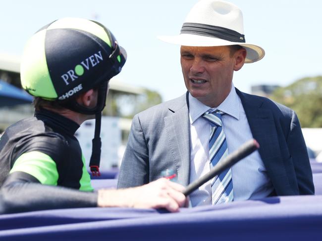 SYDNEY, AUSTRALIA - JANUARY 04: Trainer Joseph Pride debriefs after Josh Parr riding Accredited  win Race 4 Toyota Forklifts during Sydney Racing at Royal Randwick Racecourse on January 04, 2025 in Sydney, Australia. (Photo by Jeremy Ng/Getty Images)