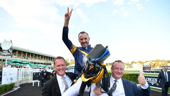 Jockey Glen Boss celebrates after riding Brutal to victory in last year’s Doncaster Mile. Picture: AAP