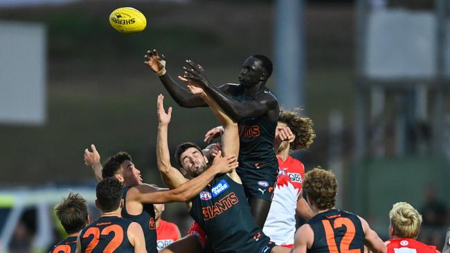 First-year Giant Leek Aleer wasn’t afraid to leap for marks in defence. Picture: Mark Jesser