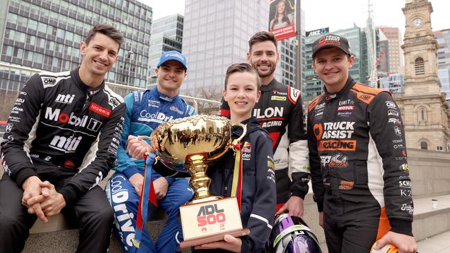 South Australian drivers Nick Percat, Tim Slade, Scott Pye and Todd Hazelwood with the number one ticket holder Jake Burton at the official launch for the 2022 Adelaide 500 earlier this year. Picture: NCA NewsWire/Kelly Barnes