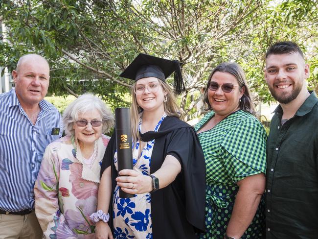 Bachelor of Nursing graduate Ellen Knight with family (from left) Bernard Knight, Merilyn Knight, Lisa Knight and Joshua Smith at a UniSQ graduation ceremony at Empire Theatres, Tuesday, October 31, 2023. Picture: Kevin Farmer