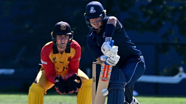 Patrick Rowe wicketkeeping against Carlton’s Evan Gulbis during the Premier Cricket preliminary final last season. Picture:Andy Brownbill