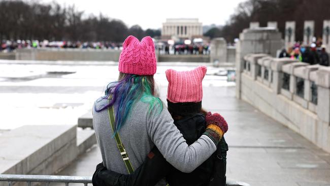 Two activists wear ‘pussy hats’ in the ‘People's March on Washington’ two days before Trump was inaugurated. Picture: Joe Raedle/Getty Images/AFP