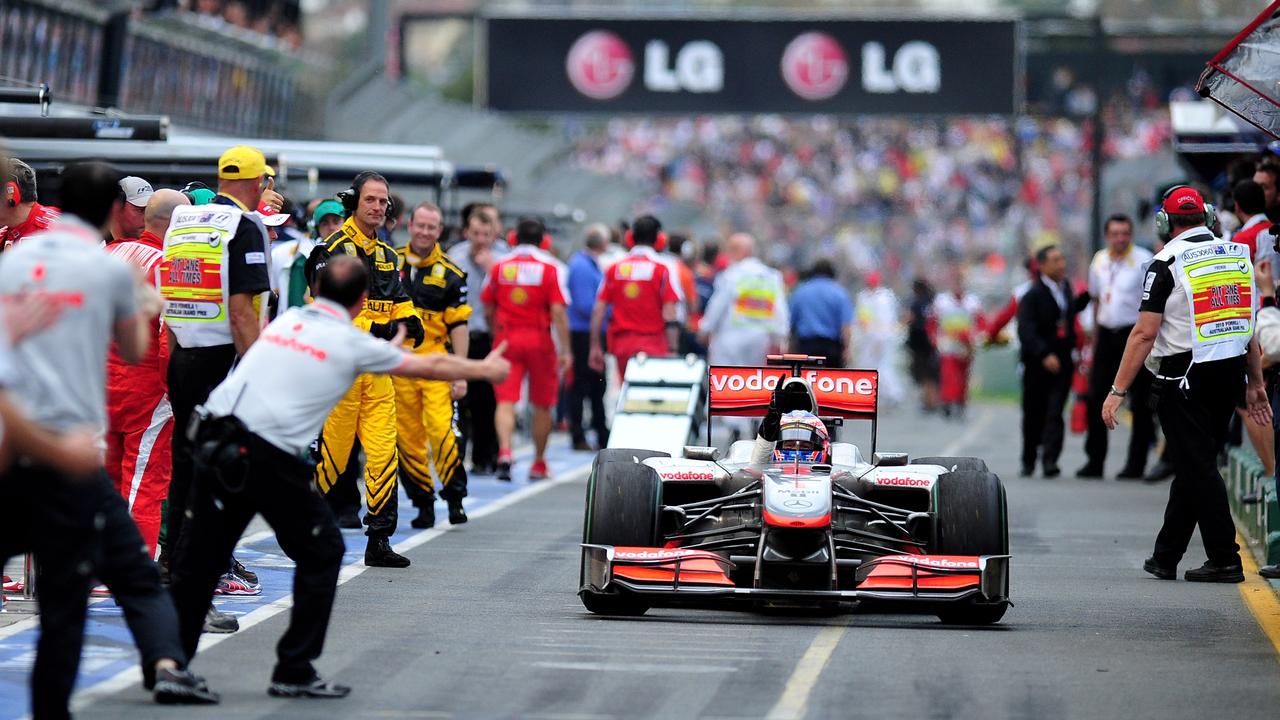 Team members acknowledge Jenson Button’s stunning win in Melbourne in 2010.