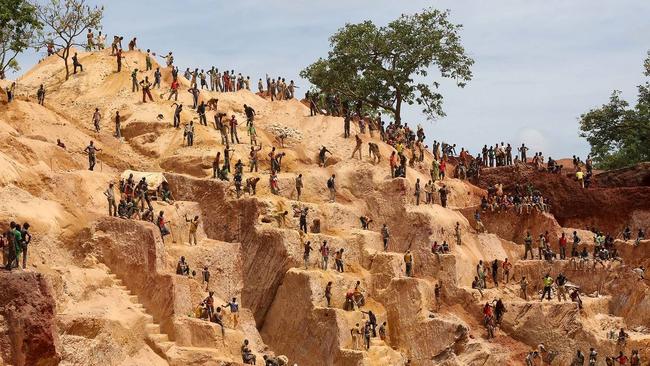 Prospectors work at the open-pit Djoubissi gold mine in Central African Republic. Picture: Reuters