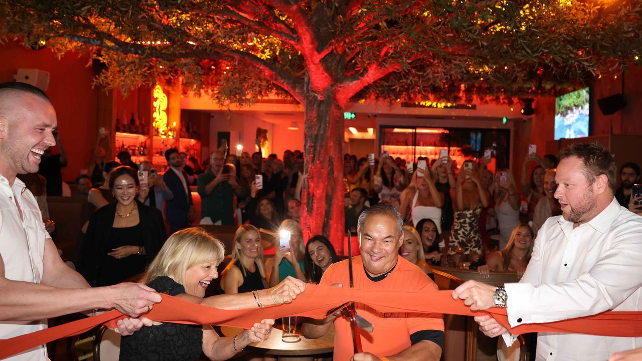 Trent Redman, Deputy Mayor Donna Gates, Mayor Tom Tate and Cody Beck officially open JUJU Restaurant and Bar Mermaid Beach with a ribbon cutting - eventually. Picture: Portia Large. DISCLAIMER: JUJU is a client of Portia Large’s LMPR PR firm.