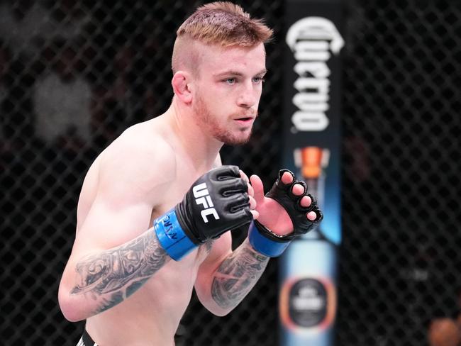 LAS VEGAS, NEVADA - JANUARY 13: (L-R) Tom Nolan of Australia battles Nikolas Motta of Brazil in a lightweight fight during the UFC Fight Night event at UFC APEX on January 13, 2024 in Las Vegas, Nevada. (Photo by Chris Unger/Zuffa LLC via Getty Images)