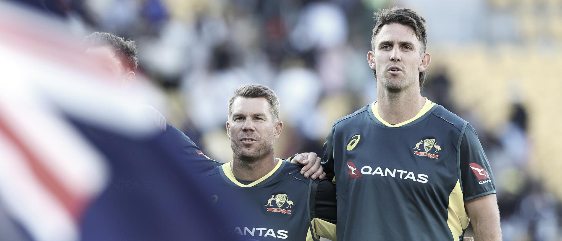 WELLINGTON, NEW ZEALAND - FEBRUARY 21: David Warner and Mitchell Marsh of Australia sing the national anthem during game one of the Men's T20 International series between New Zealand and Australia at Sky Stadium on February 21, 2024 in Wellington, New Zealand. (Photo by Hagen Hopkins/Getty Images)