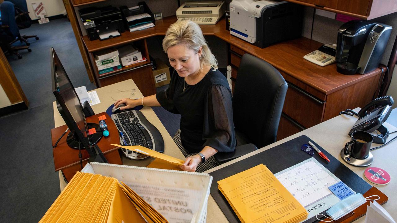 A worker at the Wood County Clerk’s office sorts through mail-in ballots in Parkersburg, West Virginia, on October 21, 2020. Picture: Stephen Zenner/AFP