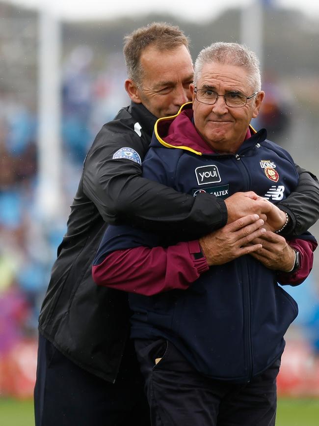 Alastair Clarkson and Chris Fagan share a hug in 2023.