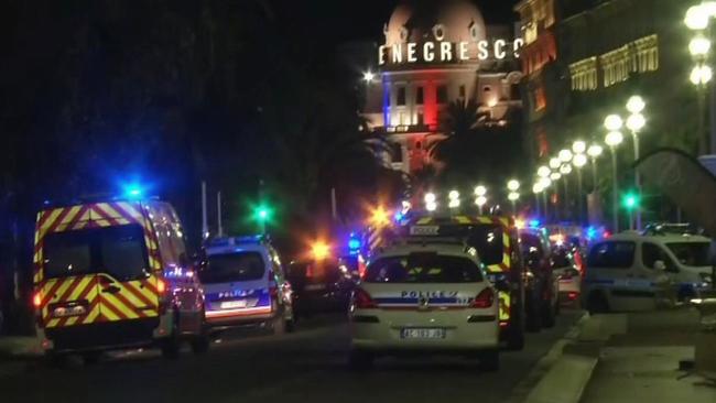 Ambulances and police cars at the French resort city of Nice where a truck ploughed through a crowd of revellers, killings dozens and injuring scores more. Picture: AP