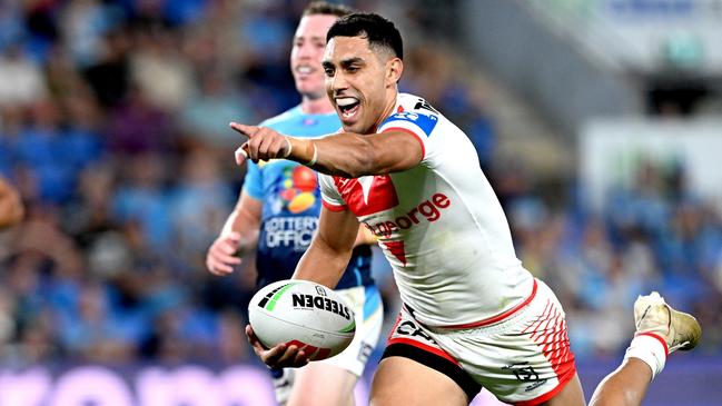 GOLD COAST, AUSTRALIA - MARCH 09: Tyrell Sloan of the Dragons celebrates after scoring a try during the round one NRL match between the Gold Coast Titans and St George Illawarra Dragons at Cbus Super Stadium, on March 09, 2024, in Gold Coast, Australia. (Photo by Bradley Kanaris/Getty Images)