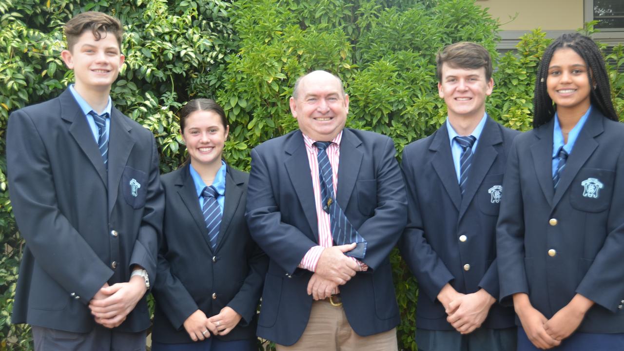 Asha Cooper (far right) with Kingaroy State High School's 2020 student leaders: Toby Schmidt (vice-captain), Olivia Eriksen (school captain), Ashley Roediger (principal), and Lachlan Hansen (school captain).