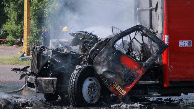 A burned truck is seen on the streets of Culiacan, Sinaloa State, Mexico, on September 11, 2024. Elements of Mexico's National Guard were deployed in the state of Sinaloa, in the northwest of the country, amid an escalation of violence that authorities attribute to internal struggles within the Sinaloa cartel following the capture of its leader, Ismael "Mayo" Zambada. (Photo by Ivan MEDINA / AFP)