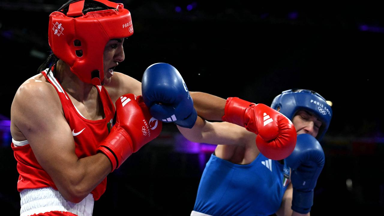 Imane Khelif punches Italy’s Angela Carini. Picture: Mohd Rasfan/AFP