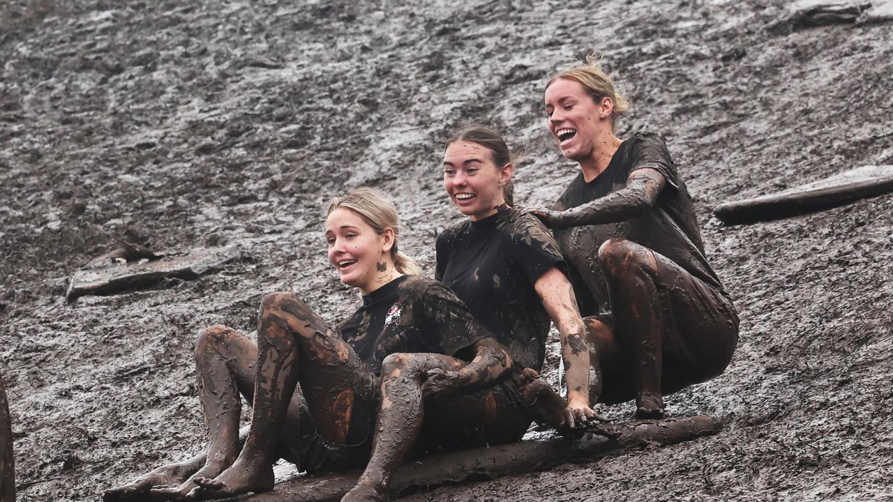 Mudsliding on North Burleigh Hill. Picture Glenn Hampson