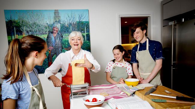 Australian cook and restaurateur Stephanie Alexander in her kitchen garden with kids Riley, Clara and Lucy. Picture: Nicole Cleary