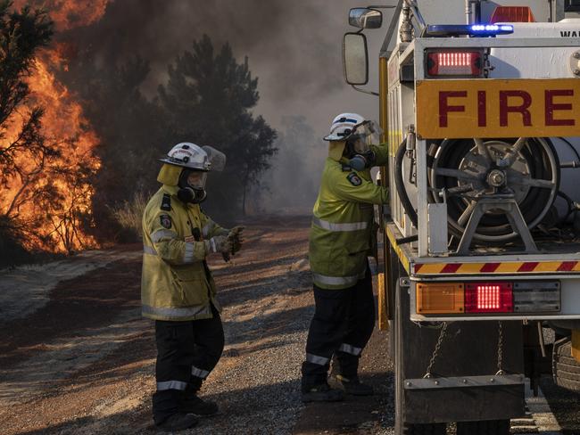 Firefighters at work battling the bushfires at Yanchep, Western Australia, 14-12-2019. Picture: Supplied by DFES - Department of Fire and Emergency Services Incident Photographer Evan Collis