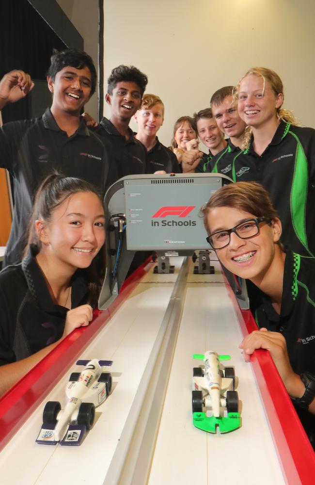 It’s no worries for these kids to stay back and check how fast their cars go. Picture Glenn Hampson