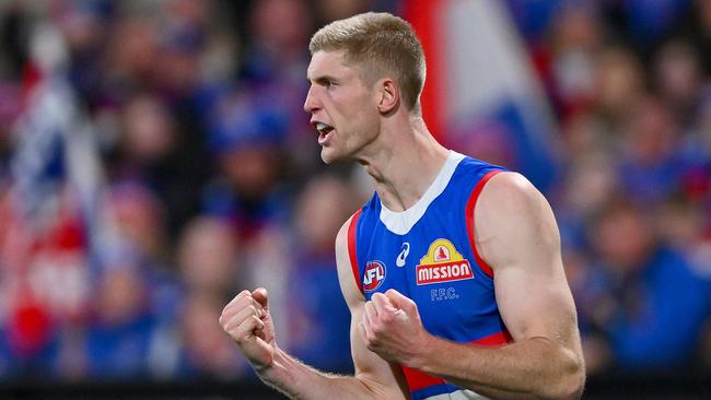 GEELONG, AUSTRALIA - AUGUST 26: Tim English of the Bulldogs celebrates a goal during the round 24 AFL match between Geelong Cats and Western Bulldogs at GMHBA Stadium, on August 26, 2023, in Geelong, Australia. (Photo by Morgan Hancock/Getty Images)